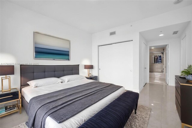 17301 Biscayne Blvd Unit 1108, Aventura, FL 33160 - bedroom featuring a closet, light tile patterned floors, and recessed lighting