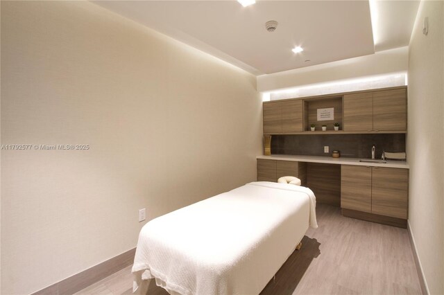 17301 Biscayne Blvd Unit 1108, Aventura, FL 33160 - bedroom with light wood finished floors and bar with sink