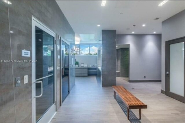 17301 Biscayne Blvd Unit 1108, Aventura, FL 33160 - hall with wood finished floors and recessed lighting