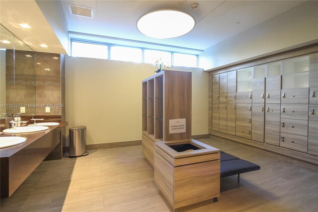17301 Biscayne Blvd Unit 1108, Aventura, FL 33160 - bathroom featuring double vanity and wood finished floors