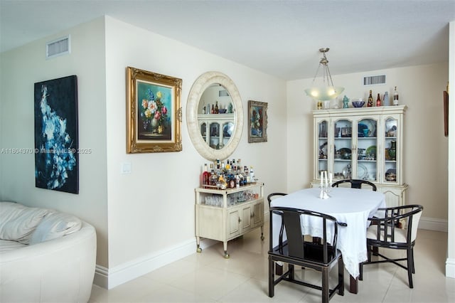 1250 S Miami Ave Unit 3106, Miami, FL 33130 - dining room featuring baseboards and light tile patterned floors