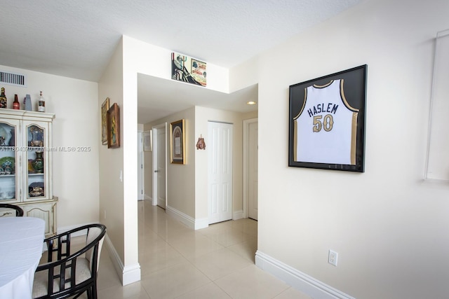 1250 S Miami Ave Unit 3106, Miami, FL 33130 - corridor with light tile patterned flooring and baseboards