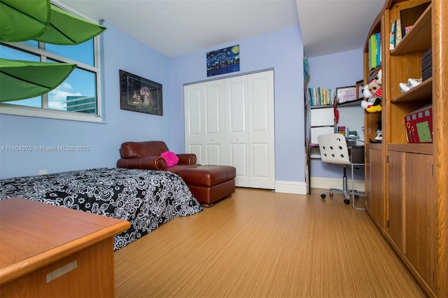 1250 S Miami Ave Unit 3106, Miami, FL 33130 - bedroom featuring a closet and wood finished floors
