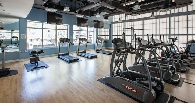 1250 S Miami Ave Unit 3106, Miami, FL 33130 - workout area featuring wood finished floors and baseboards