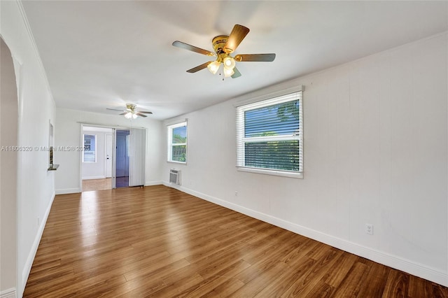 5861 NW 18th Ct, Sunrise, FL 33313 - empty room featuring wood finished floors, ceiling fan, and baseboards