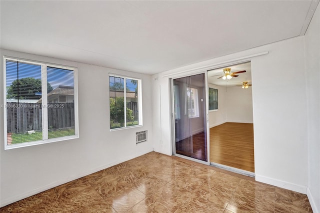 5861 NW 18th Ct, Sunrise, FL 33313 - unfurnished room with baseboards and ceiling fan