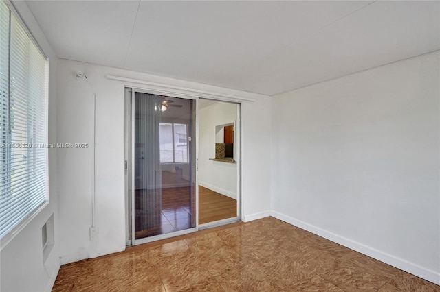 5861 NW 18th Ct, Sunrise, FL 33313 - spare room with baseboards