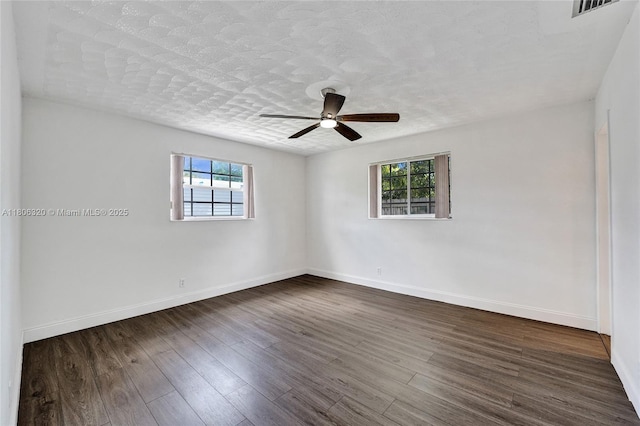 5861 NW 18th Ct, Sunrise, FL 33313 - unfurnished room with plenty of natural light, baseboards, ceiling fan, and a textured ceiling