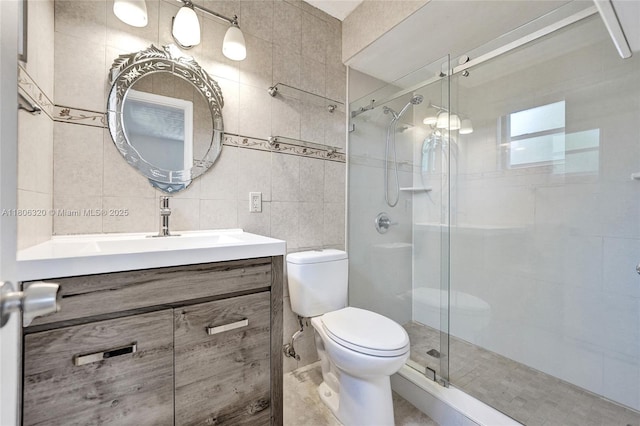 5861 NW 18th Ct, Sunrise, FL 33313 - bathroom with tile walls, a shower stall, toilet, and vanity