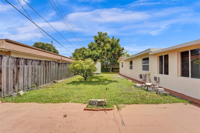 5861 NW 18th Ct, Sunrise, FL 33313 - view of yard featuring a patio, an outdoor structure, and cooling unit