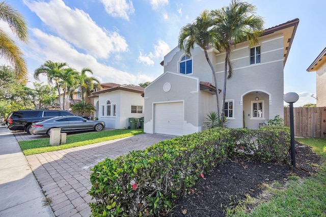 1136 NE 41st Ave, Homestead, FL 33033 - mediterranean / spanish-style home with stucco siding and driveway