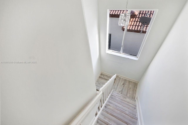 1136 NE 41st Ave, Homestead, FL 33033 - stairs featuring wood finished floors and baseboards