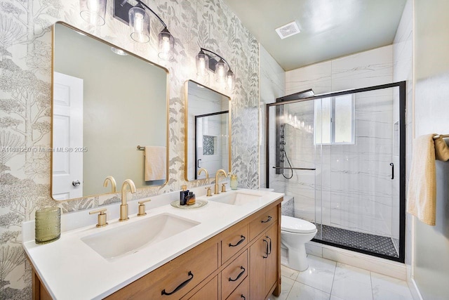 1136 NE 41st Ave, Homestead, FL 33033 - bathroom featuring marble look tiles, a shower stall, double vanity, toilet, and wallpapered walls