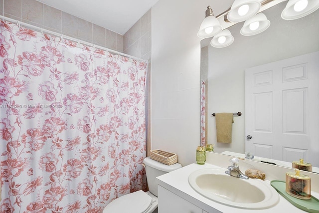 1136 NE 41st Ave, Homestead, FL 33033 - full bathroom featuring vanity, toilet, and curtained shower