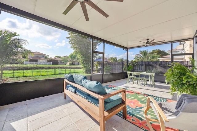 1136 NE 41st Ave, Homestead, FL 33033 - sunroom / solarium with a ceiling fan and outdoor dining area