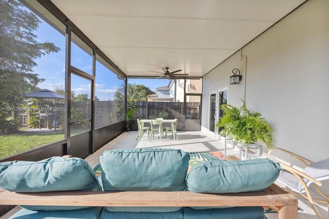 1136 NE 41st Ave, Homestead, FL 33033 - sunroom with outdoor dining space and ceiling fan