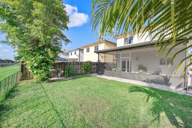 1136 NE 41st Ave, Homestead, FL 33033 - view of yard featuring a sunroom