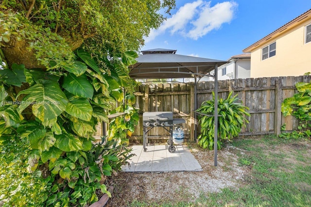 1136 NE 41st Ave, Homestead, FL 33033 - view of yard with a gazebo and a patio area