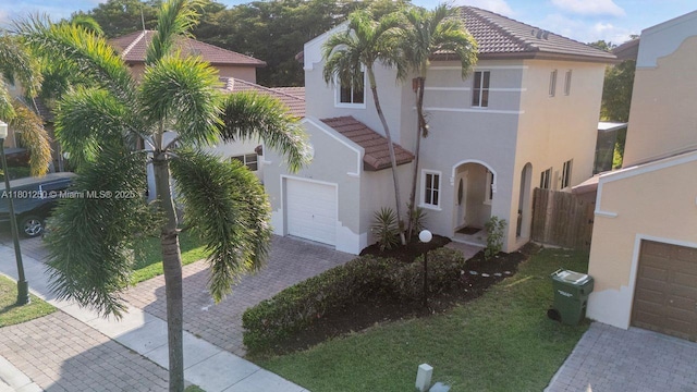 1136 NE 41st Ave, Homestead, FL 33033 - mediterranean / spanish home with decorative driveway, stucco siding, and a tiled roof