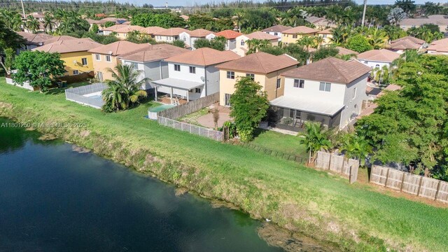 1136 NE 41st Ave, Homestead, FL 33033 - aerial perspective of suburban area with a large body of water