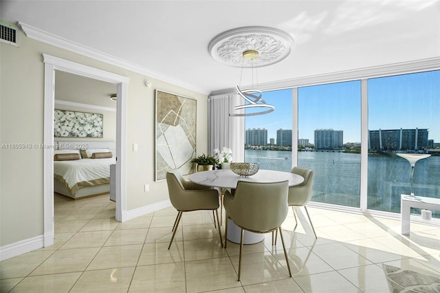 18000 N Bay Rd Unit 803, Sunny Isles Beach, FL 33160 - dining room featuring light tile patterned floors, ornamental molding, baseboards, a chandelier, and a view of skyline