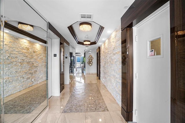 18000 N Bay Rd Unit 803, Sunny Isles Beach, FL 33160 - corridor featuring a tray ceiling