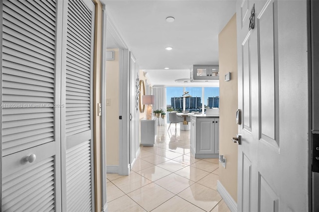 18000 N Bay Rd Unit 803, Sunny Isles Beach, FL 33160 - hall featuring baseboards, light tile patterned flooring, and recessed lighting