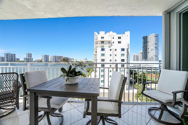 18000 N Bay Rd Unit 803, Sunny Isles Beach, FL 33160 - balcony featuring a skyline view and a water view