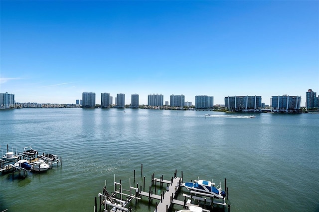 18000 N Bay Rd Unit 803, Sunny Isles Beach, FL 33160 - water view featuring a dock, skyline, and boat lift