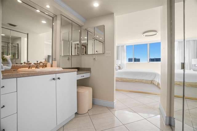 18000 N Bay Rd Unit 803, Sunny Isles Beach, FL 33160 - bathroom with ensuite bath, vanity, baseboards, recessed lighting, and tile patterned floors