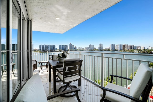 18000 N Bay Rd Unit 803, Sunny Isles Beach, FL 33160 - balcony featuring a view of skyline and a water view