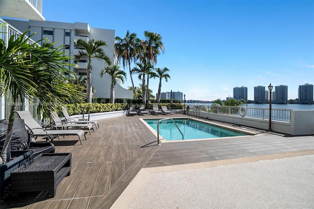 18000 N Bay Rd Unit 803, Sunny Isles Beach, FL 33160 - community pool featuring a patio area and a water view
