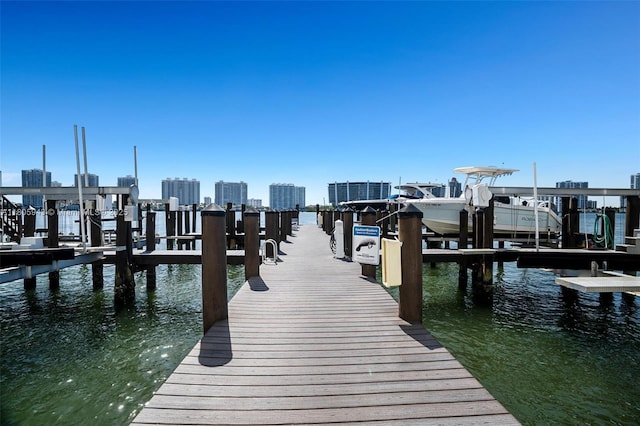 18000 N Bay Rd Unit 803, Sunny Isles Beach, FL 33160 - dock with boat lift and a water view