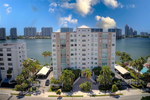 18000 N Bay Rd Unit 803, Sunny Isles Beach, FL 33160 - view of building exterior with a skyline view and a water view