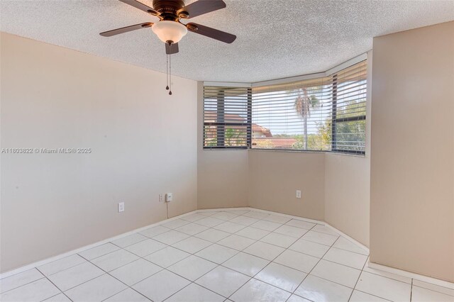 7401 NW 16th St Unit 408, Plantation, FL 33313 - unfurnished room with a textured ceiling, ceiling fan, and light tile patterned floors