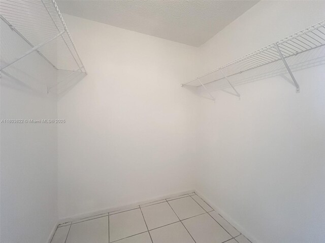 7401 NW 16th St Unit 408, Plantation, FL 33313 - spacious closet featuring light tile patterned floors