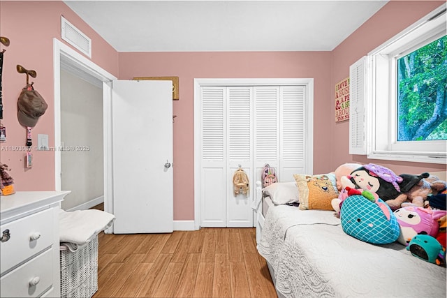 9491 SW 54th St, Miami, FL 33165 - bedroom with light wood-style flooring, a closet, and baseboards