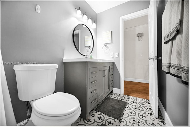 9491 SW 54th St, Miami, FL 33165 - bathroom featuring vanity, toilet, and baseboards