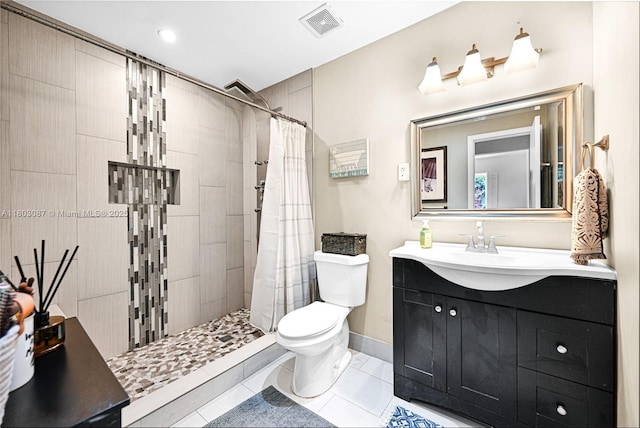 9491 SW 54th St, Miami, FL 33165 - full bath featuring vanity, toilet, a tile shower, and tile patterned flooring