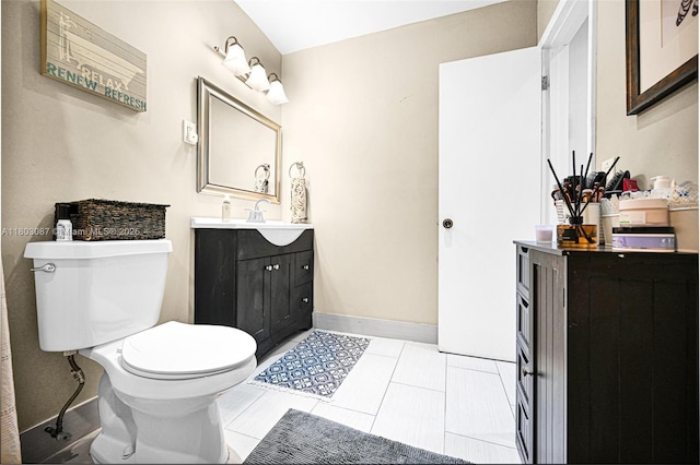 9491 SW 54th St, Miami, FL 33165 - bathroom with toilet, vanity, baseboards, and tile patterned flooring