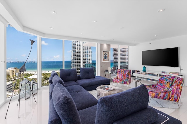 300 S Pointe Dr Unit 2005, Miami Beach, FL 33139 - living area with floor to ceiling windows, a water view, recessed lighting, and tile patterned flooring