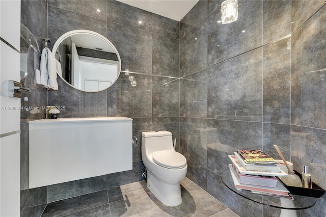 300 S Pointe Dr Unit 2005, Miami Beach, FL 33139 - half bath featuring tile walls, vanity, and tile patterned flooring