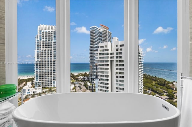 300 S Pointe Dr Unit 2005, Miami Beach, FL 33139 - bathroom featuring a water view and a freestanding bath