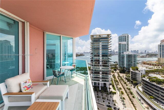 300 S Pointe Dr Unit 2005, Miami Beach, FL 33139 - balcony featuring a view of city and outdoor lounge area