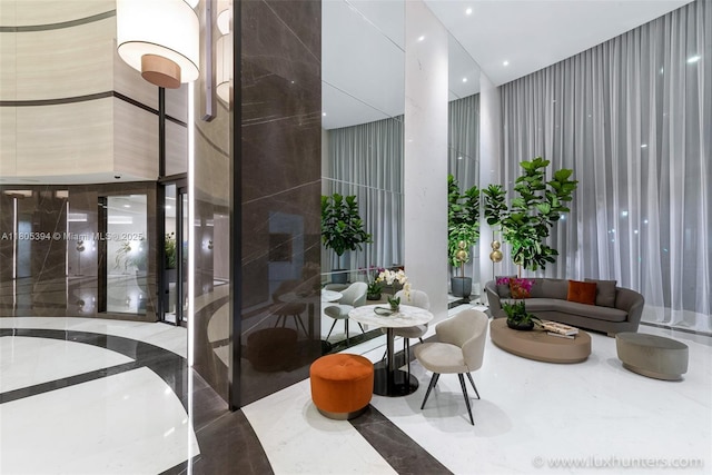 300 S Pointe Dr Unit 2005, Miami Beach, FL 33139 - community lobby with a high ceiling and recessed lighting