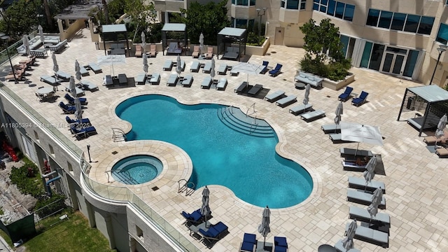 300 S Pointe Dr Unit 2005, Miami Beach, FL 33139 - community pool featuring a hot tub and a patio