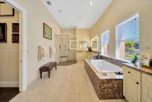 4800 SW 141st Ave, Miramar, FL 33027 - bathroom with a garden tub, a shower stall, vanity, recessed lighting, and baseboards