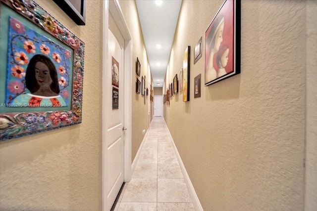 4800 SW 141st Ave, Miramar, FL 33027 - corridor featuring a textured wall, light tile patterned floors, baseboards, and recessed lighting