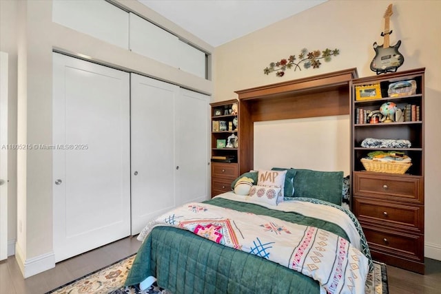 4800 SW 141st Ave, Miramar, FL 33027 - bedroom featuring a closet, wood finished floors, and baseboards