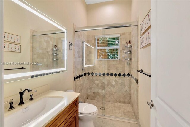 4800 SW 141st Ave, Miramar, FL 33027 - bathroom with a shower stall, vanity, toilet, and tile patterned floors